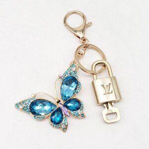 Authentic Louis Vuitton Lock & Key W/ Unbranded Elegant Blue Butterfly Keychain